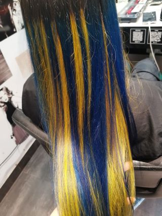 “Vivid contrast meets precision color blocking: deep navy melting into electric yellow for a bold, high-impact finish....